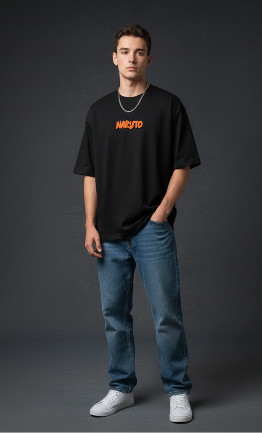 Person wearing a black t-shirt with 'Naruto' logo and blue jeans on a gray background