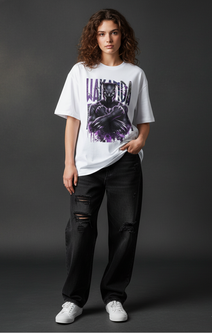 Model wearing an oversized Black Panther Wakanda Forever graphic tee made of heavy cotton fabric.